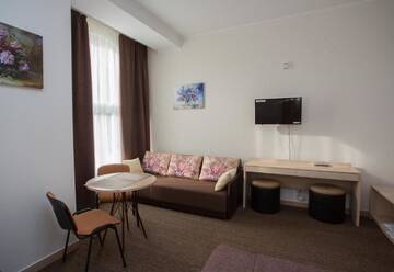 Фото номера Стандартные апартаменты Гостиница Atrium Kings Way г. Севастополь 4